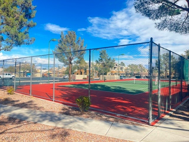 8070 West Russell Road, Unit 2068 Las Vegas, NV 89113 - Photo 2 of 7 View of sport court featuring fence