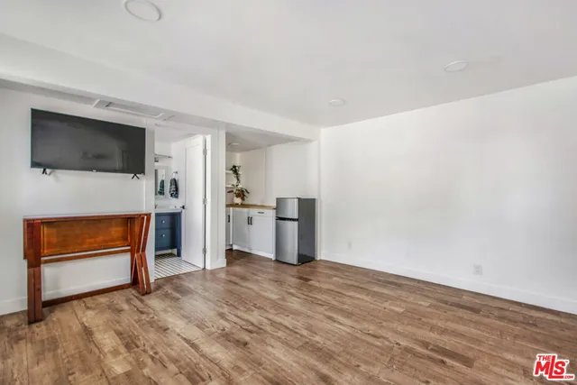 a view of livingroom with kitchen