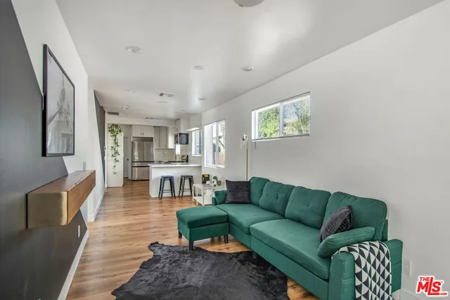 a living room with furniture and a couch