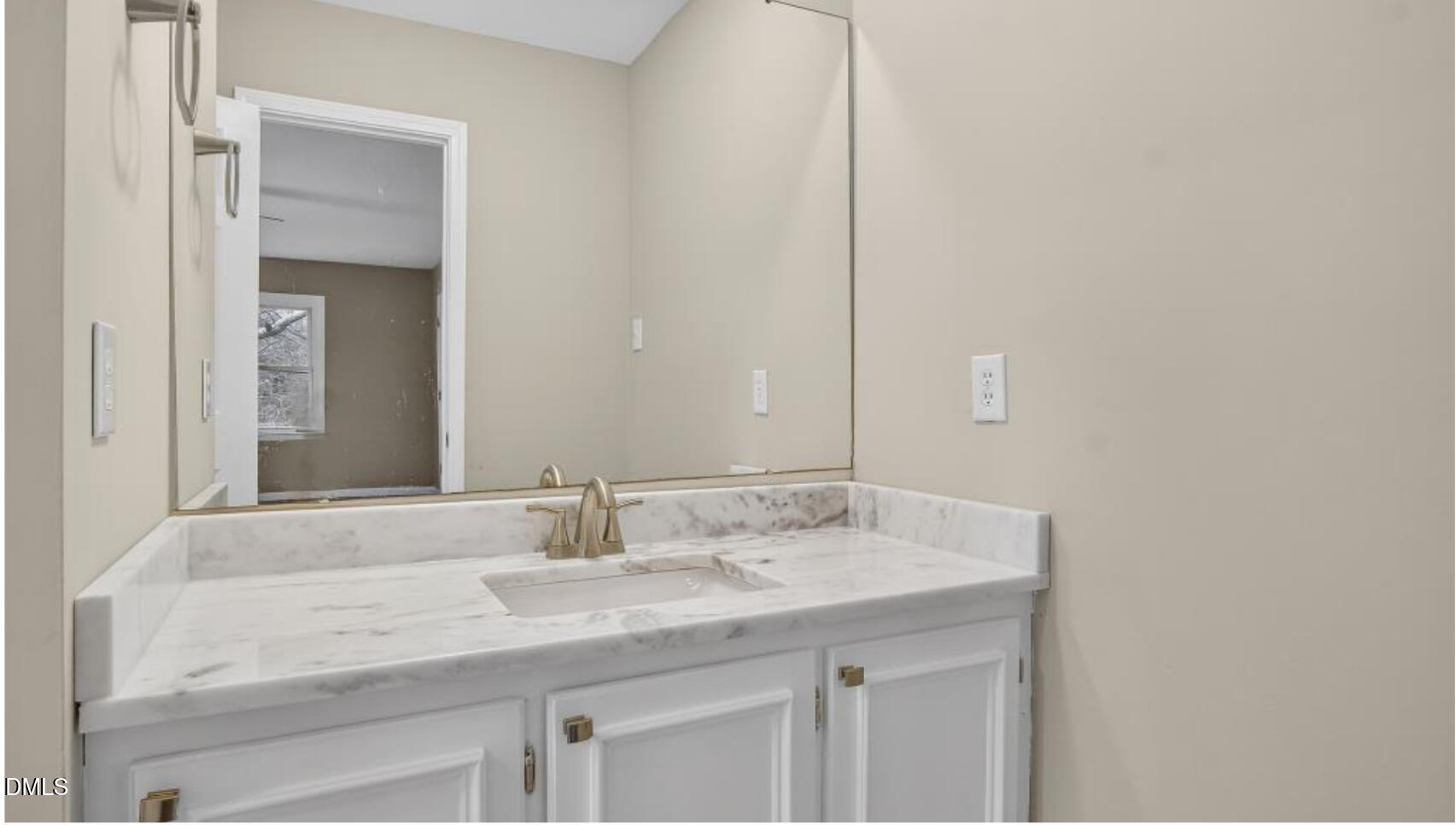 13013 Meadow Ridge Drive Rougemont, NC 27572 - Photo 12 of 27 a bathroom with a granite countertop sink and a mirror