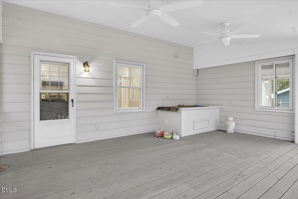 13013 Meadow Ridge Drive Rougemont, NC 27572 - Photo 20 of 27 a view of empty room with cabinet and window