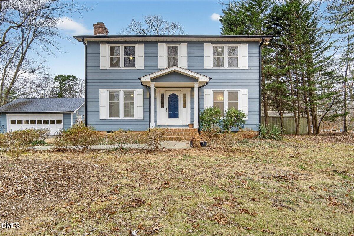 13013 Meadow Ridge Drive Rougemont, NC 27572 - Photo 2 of 27 a front view of a house with a yard