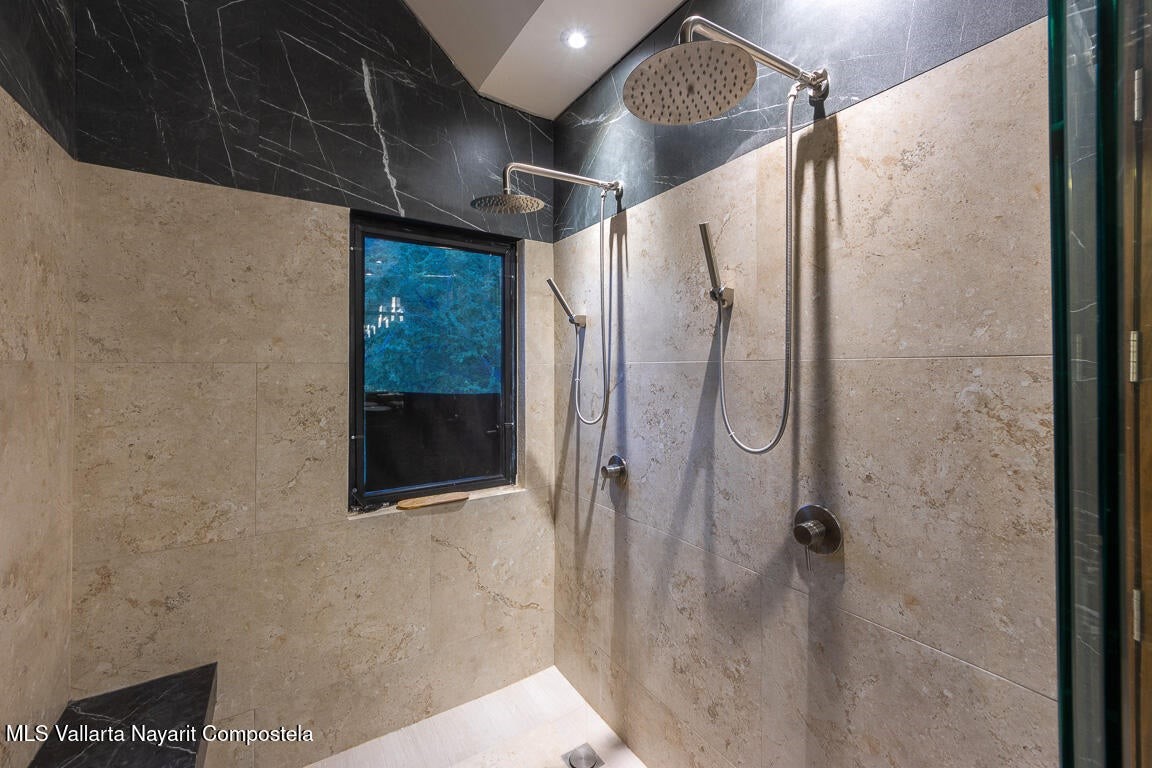 31 Invierno Davisburg, undefined 48350 - Photo 31 of 37 a bathroom with a shower and a glass door