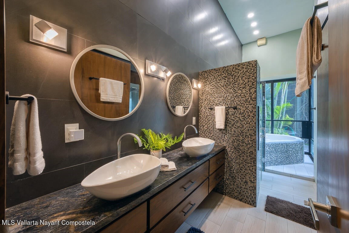 31 Invierno Davisburg, undefined 48350 - Photo 9 of 37 a bathroom with a toilet mirror and vanity