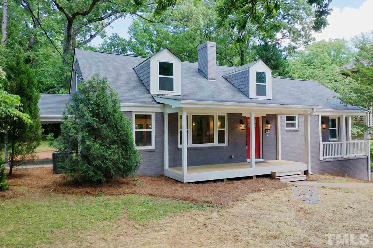 1304 Dixie Trail Raleigh, NC 27607 - Photo 1 of 26 front view of a house with a yard