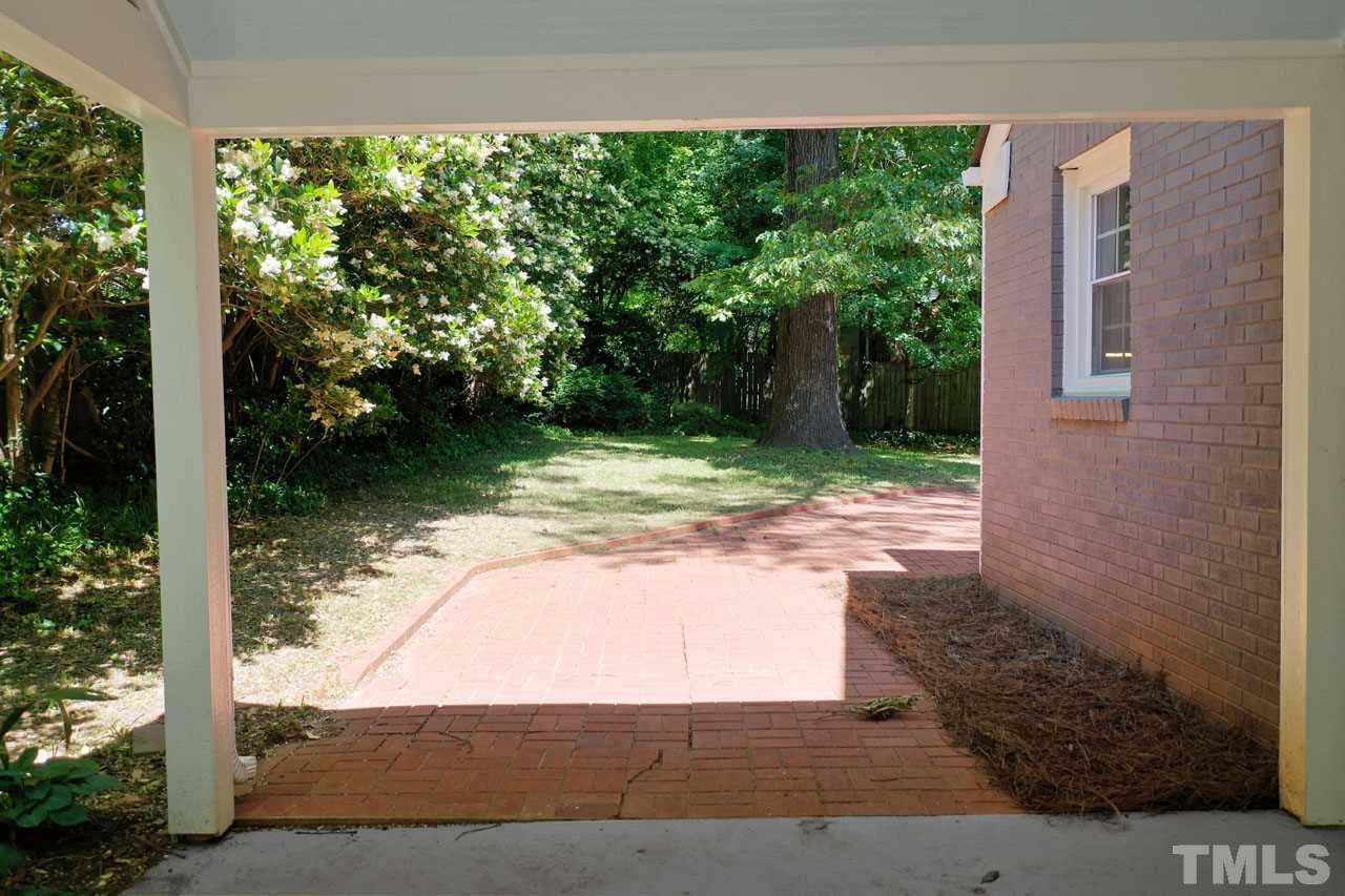 1304 Dixie Trail Raleigh, NC 27607 - Photo 21 of 26 a view of a back yard of the house