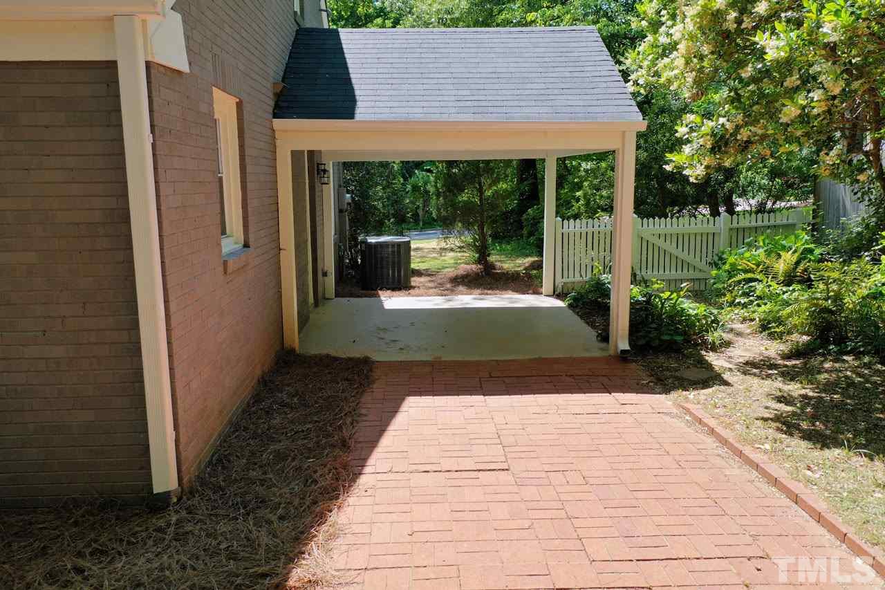 1304 Dixie Trail Raleigh, NC 27607 - Photo 22 of 26 a view of front door and small house