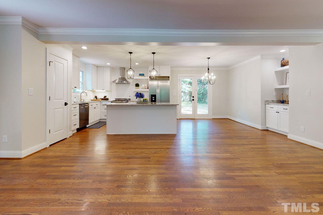 1304 Dixie Trail Raleigh, NC 27607 - Photo 4 of 26 a view of kitchen and kitchen with wooden floor