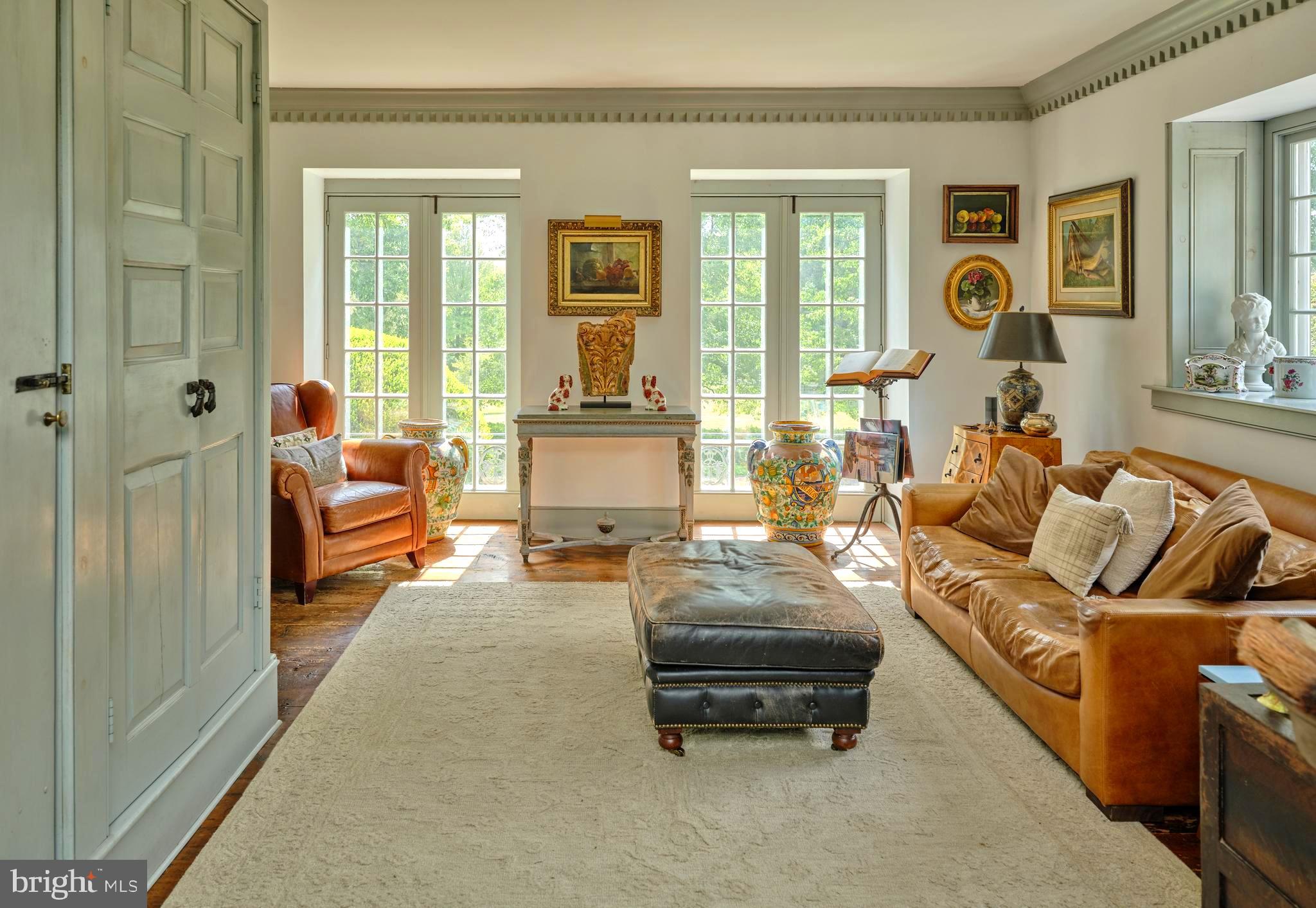 5382 Wismer Road Pipersville, PA 18947 - Photo 11 of 67 a living room with furniture and a large window