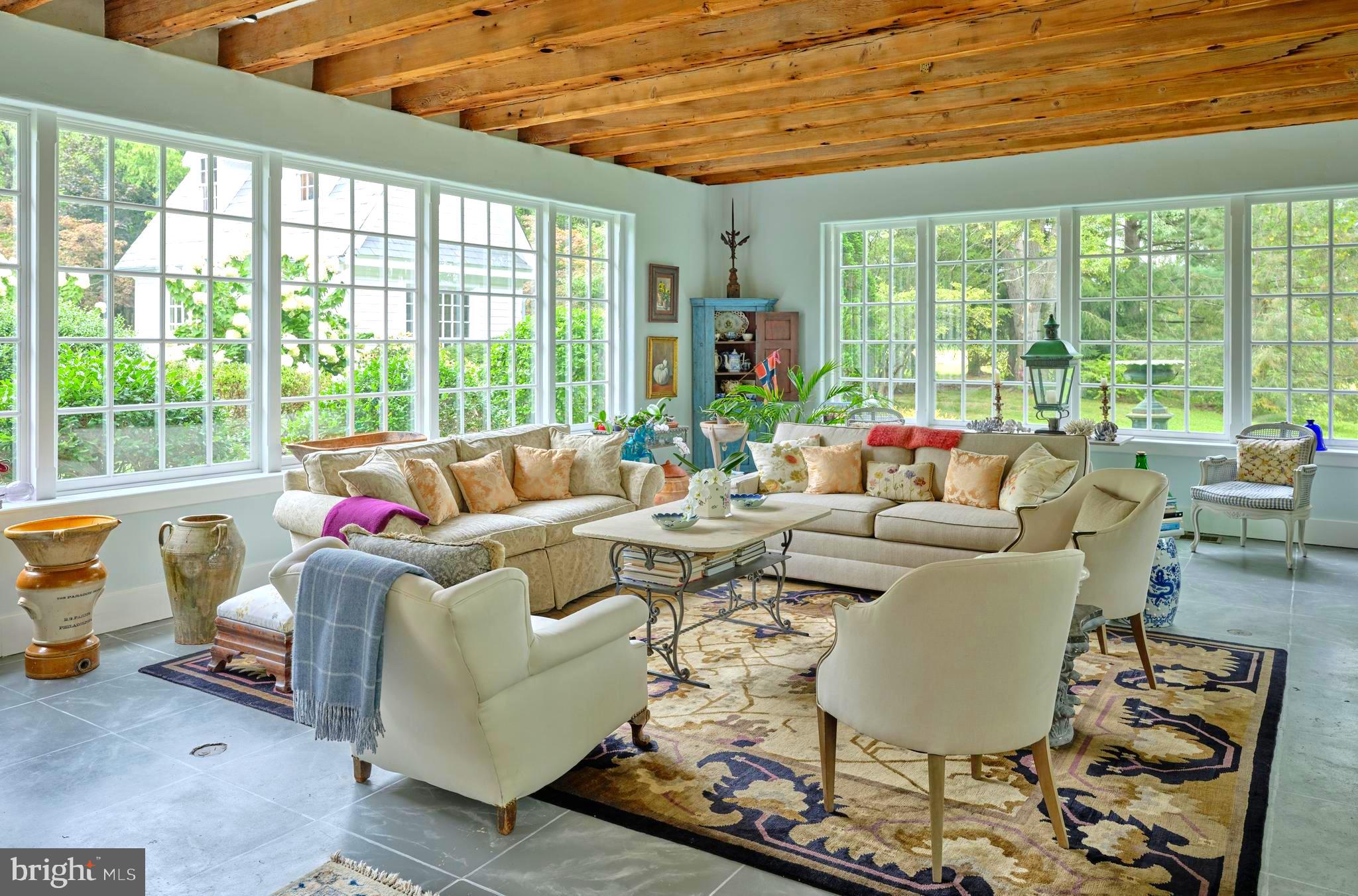 5382 Wismer Road Pipersville, PA 18947 - Photo 13 of 67 a living room with furniture and a large window