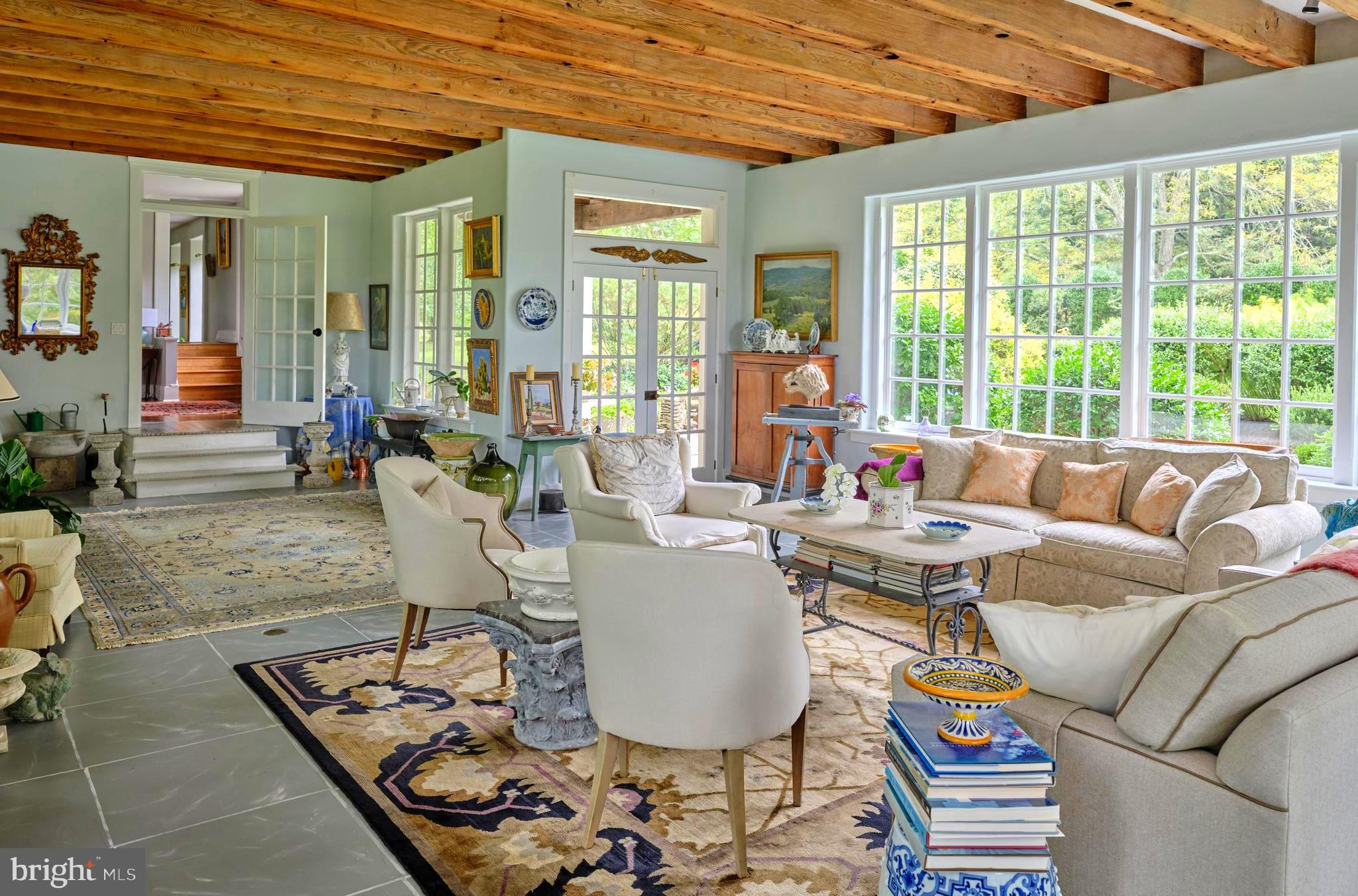 5382 Wismer Road Pipersville, PA 18947 - Photo 14 of 67 a living room with furniture and a large window