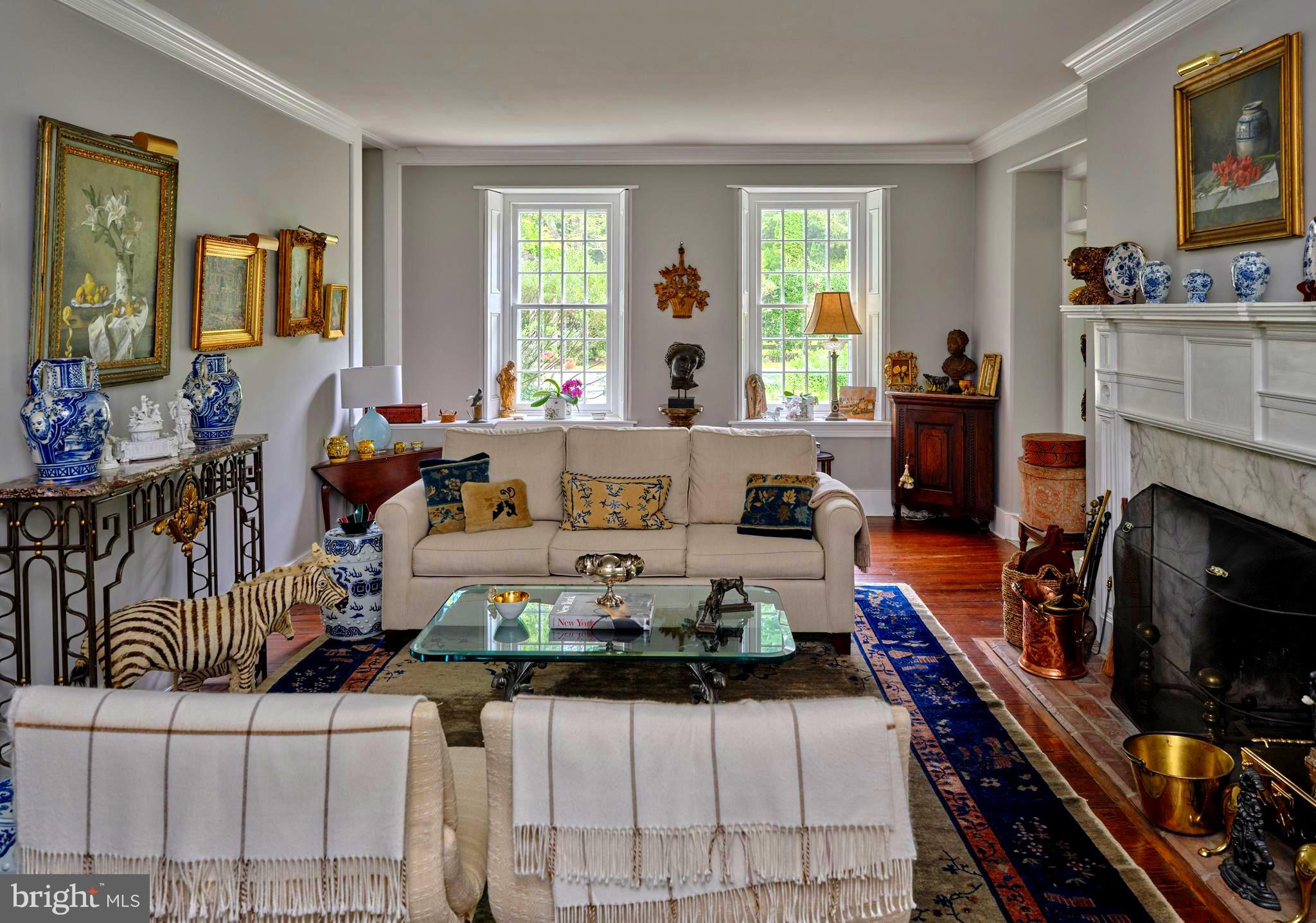 5382 Wismer Road Pipersville, PA 18947 - Photo 22 of 67 a living room with furniture fireplace and flat screen tv