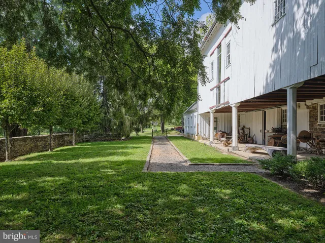 a view of a lake with a house