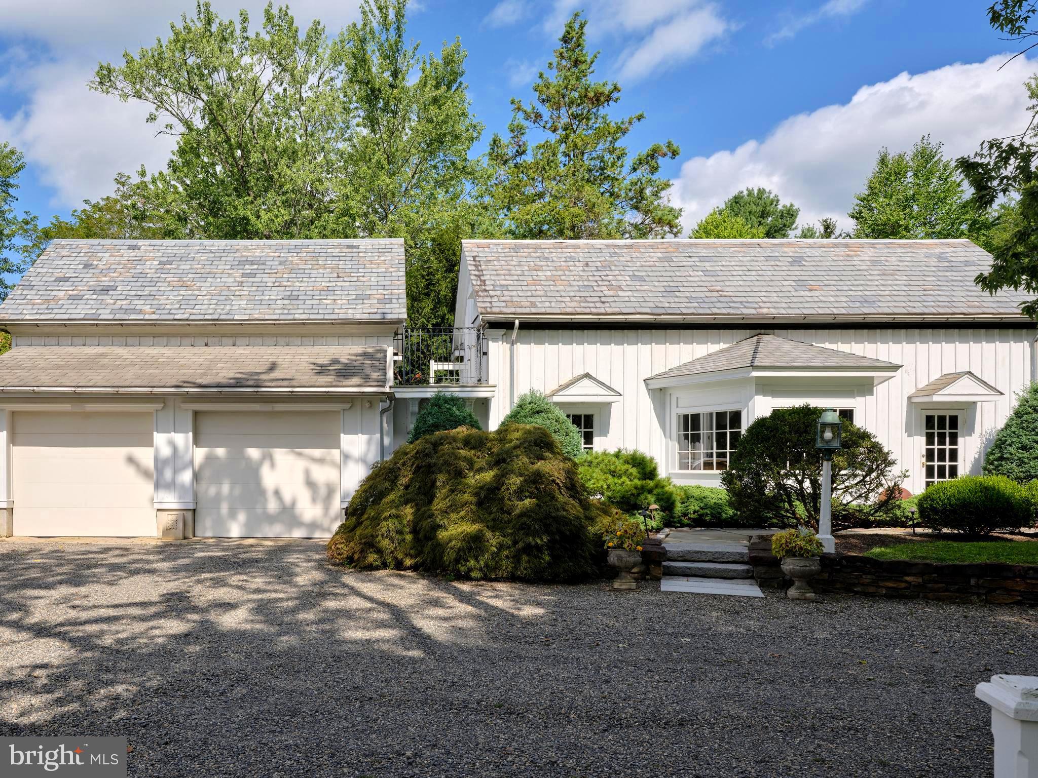 5382 Wismer Road Pipersville, PA 18947 - Photo 33 of 67 a front view of a house with garden