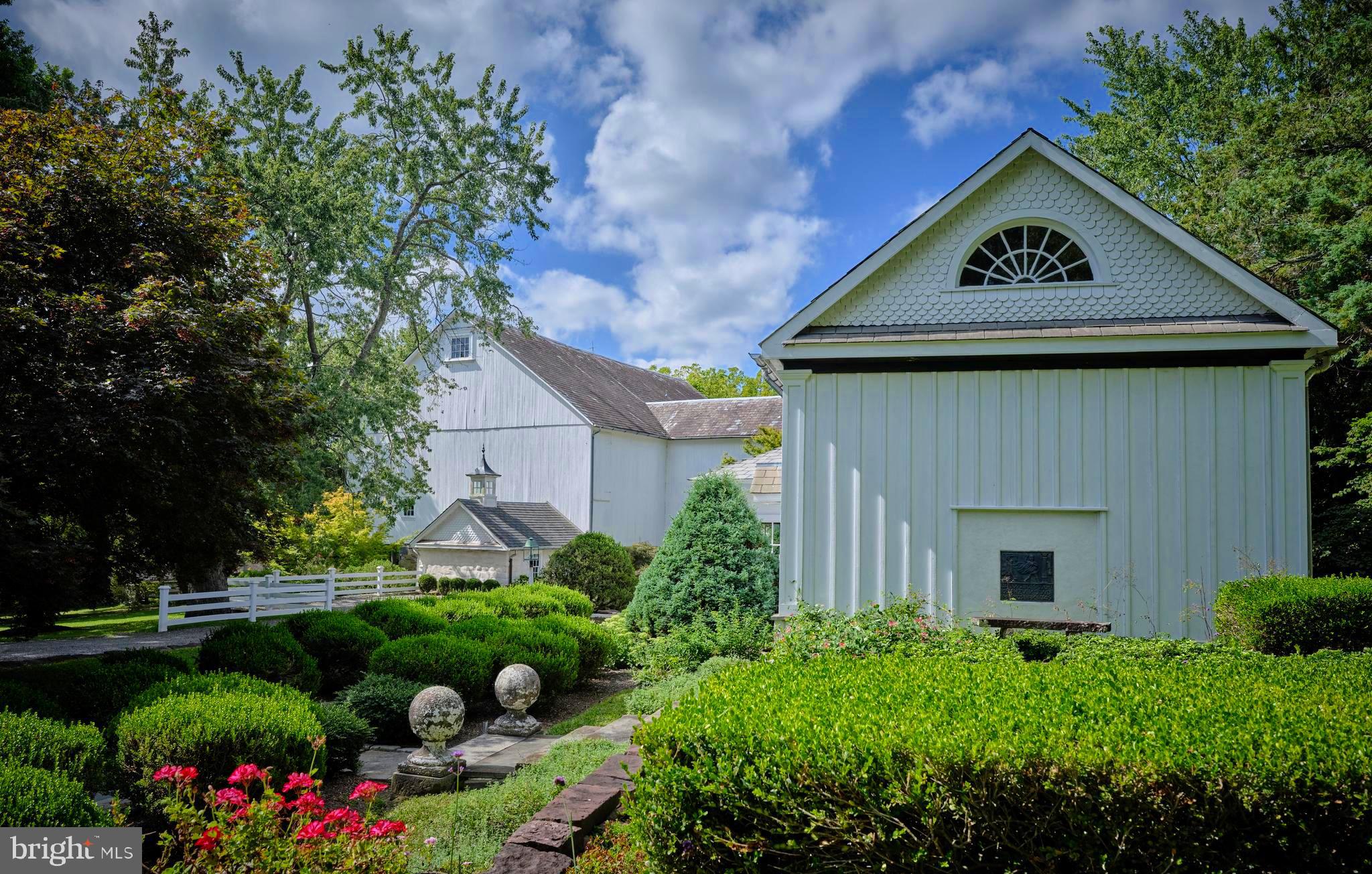 5382 Wismer Road Pipersville, PA 18947 - Photo 35 of 67 a view of a garden with a fountain