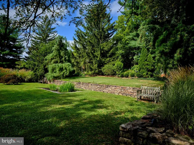 a view of a chairs and table in a patio