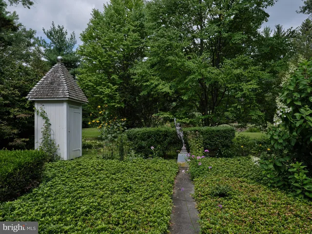 an aerial view of residential house with outdoor space