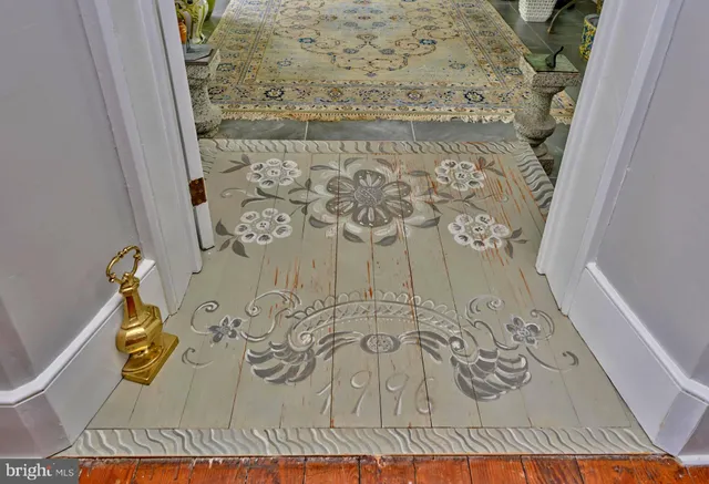 an aerial view of house with yard swimming pool and outdoor seating