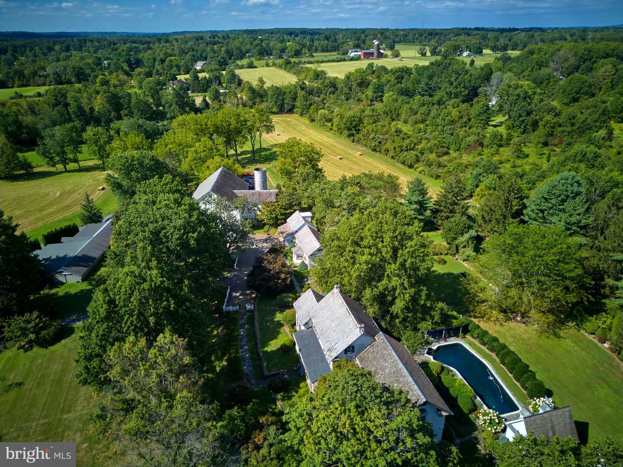 5382 Wismer Road Pipersville, PA 18947 - Photo 66 of 67 an aerial view of residential house with outdoor space and trees all around