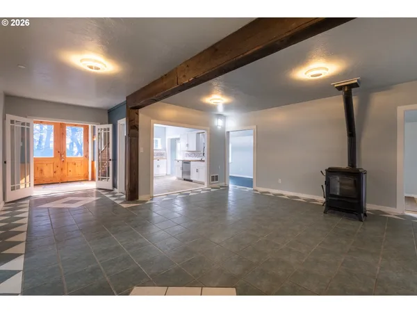 a view of an empty room and window