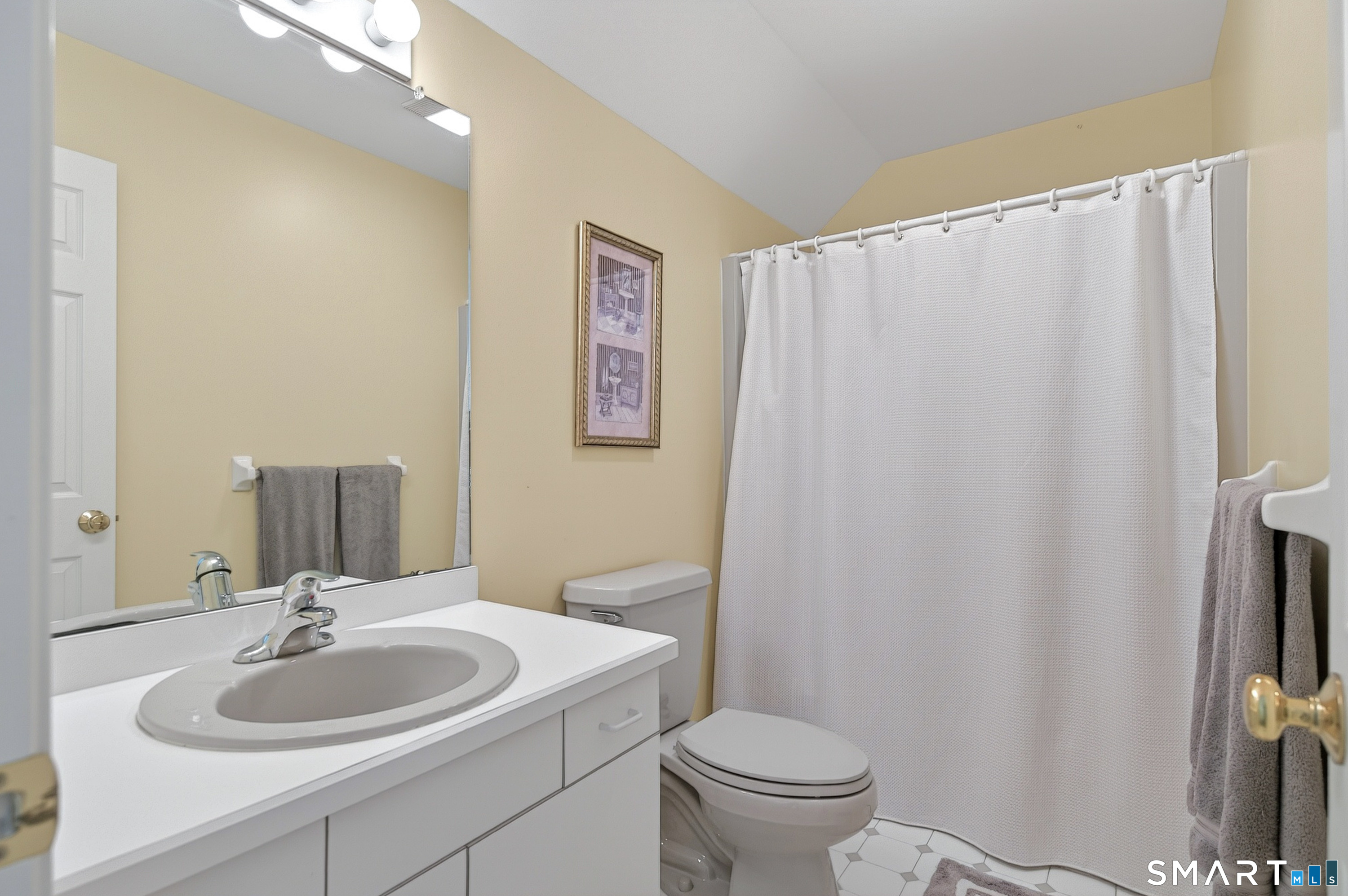 16 Farm Meadow Road Newtown, CT 06470 - Photo 16 of 40 Full upper-level bath with clean finishes, vanity storage, and shower/tub combination.