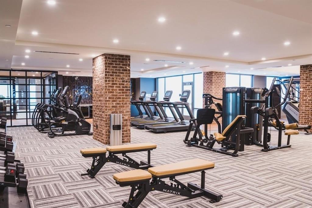 3651 Lenox Road Northeast, Unit B01 Atlanta, GA 30305 - Photo 25 of 28 a view of a room with gym equipment