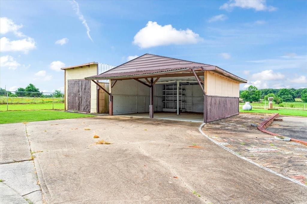 3472 Desvoignes Road Denison, TX 75021 - Photo 21 of 27 Detached Garage and Extra Storage