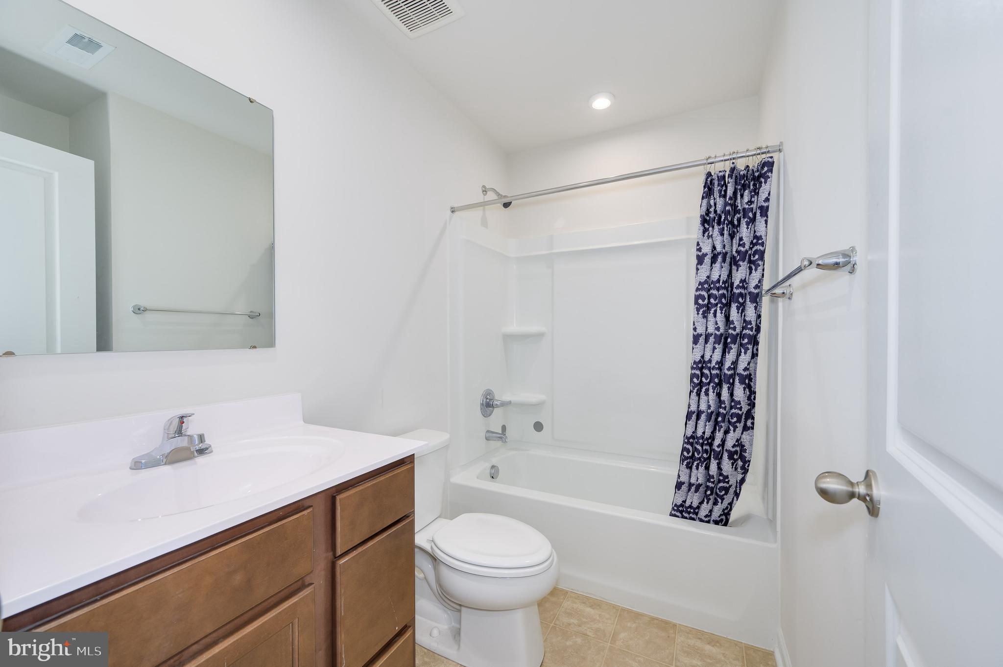 387 Bait Road Inwood, WV 25428 - Photo 29 of 41 Hall Bathroom