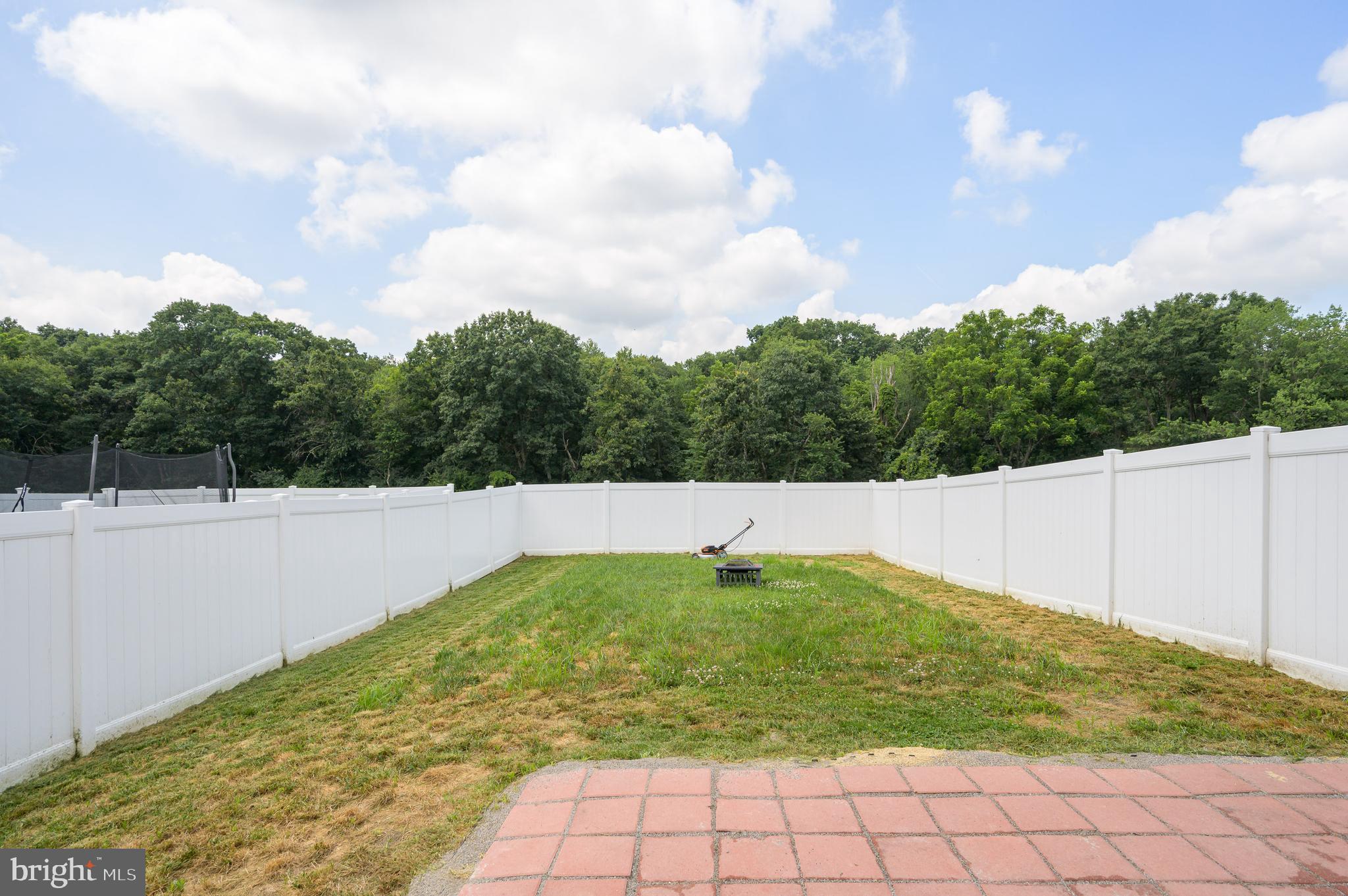 387 Bait Road Inwood, WV 25428 - Photo 38 of 41 Rear vinyl private fence and patio
