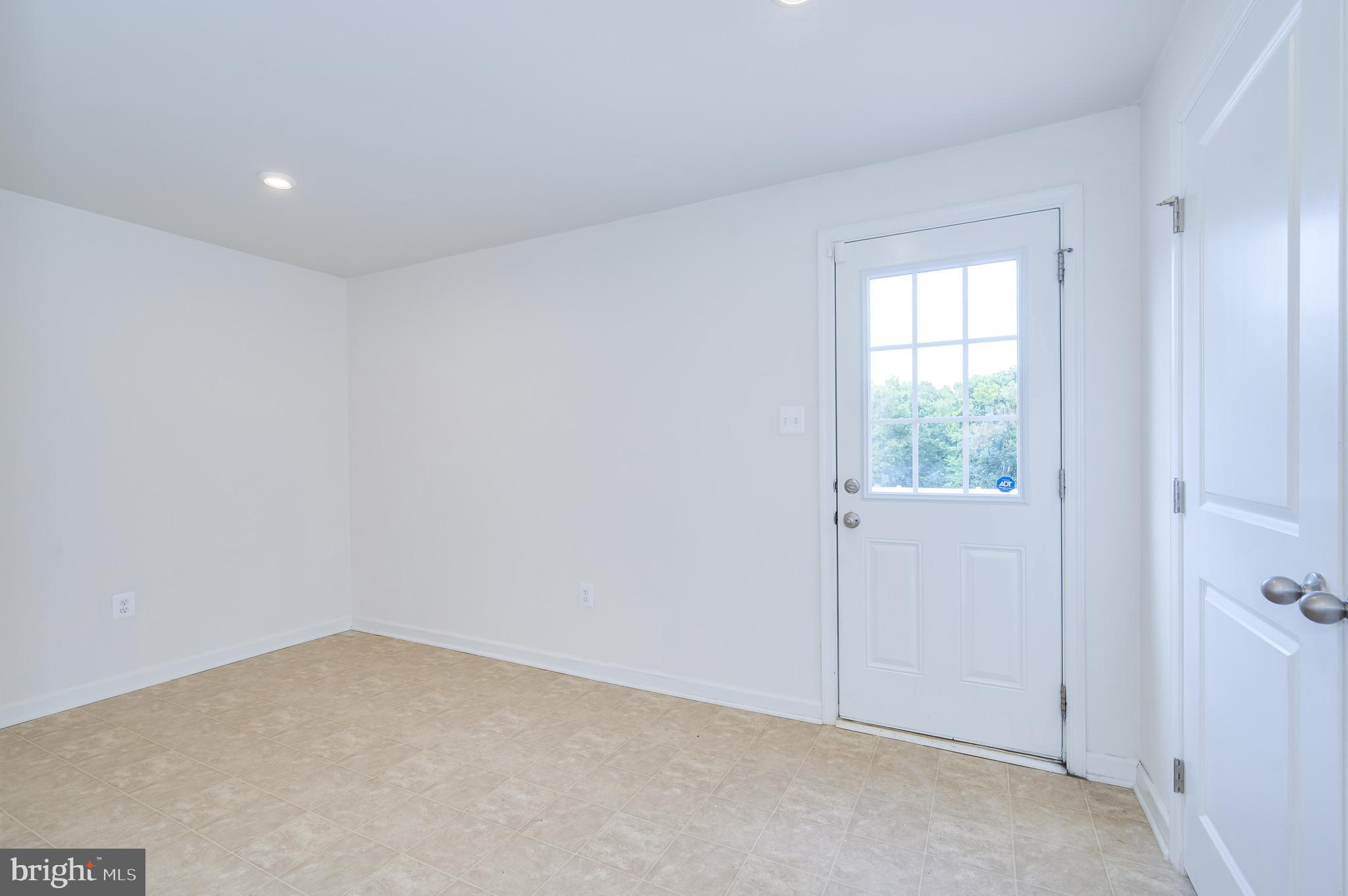 387 Bait Road Inwood, WV 25428 - Photo 8 of 41 Lower-level recreation room/flex space