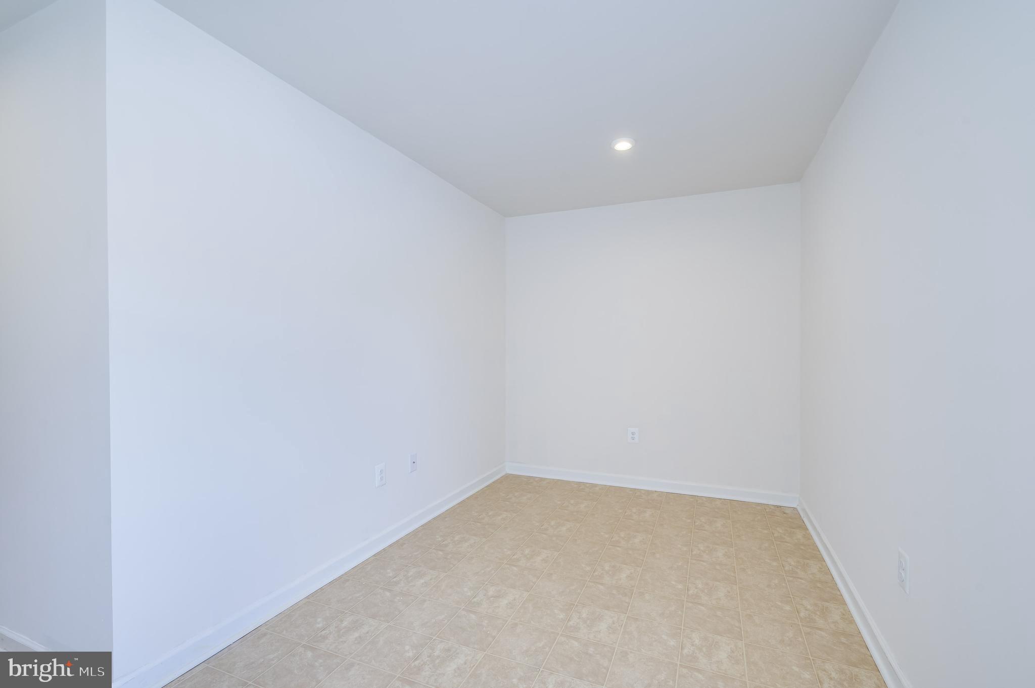 387 Bait Road Inwood, WV 25428 - Photo 9 of 41 Lower-level recreation room/flex space
