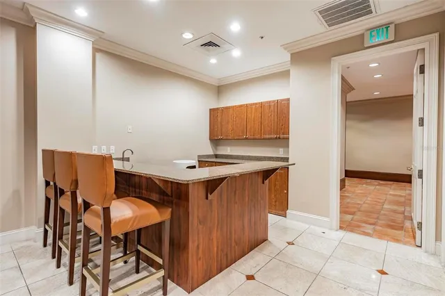 a workspace with furniture and bathroom