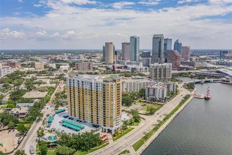 a view of a city with tall buildings