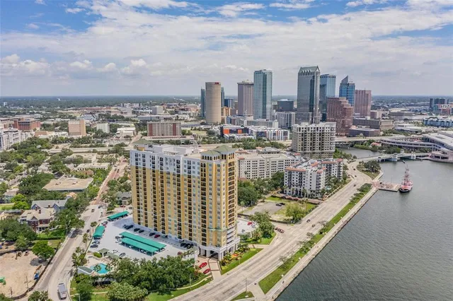 a view of a city with tall buildings