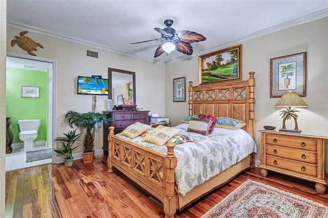 a bathroom with a sink a mirror a toilet and a shower