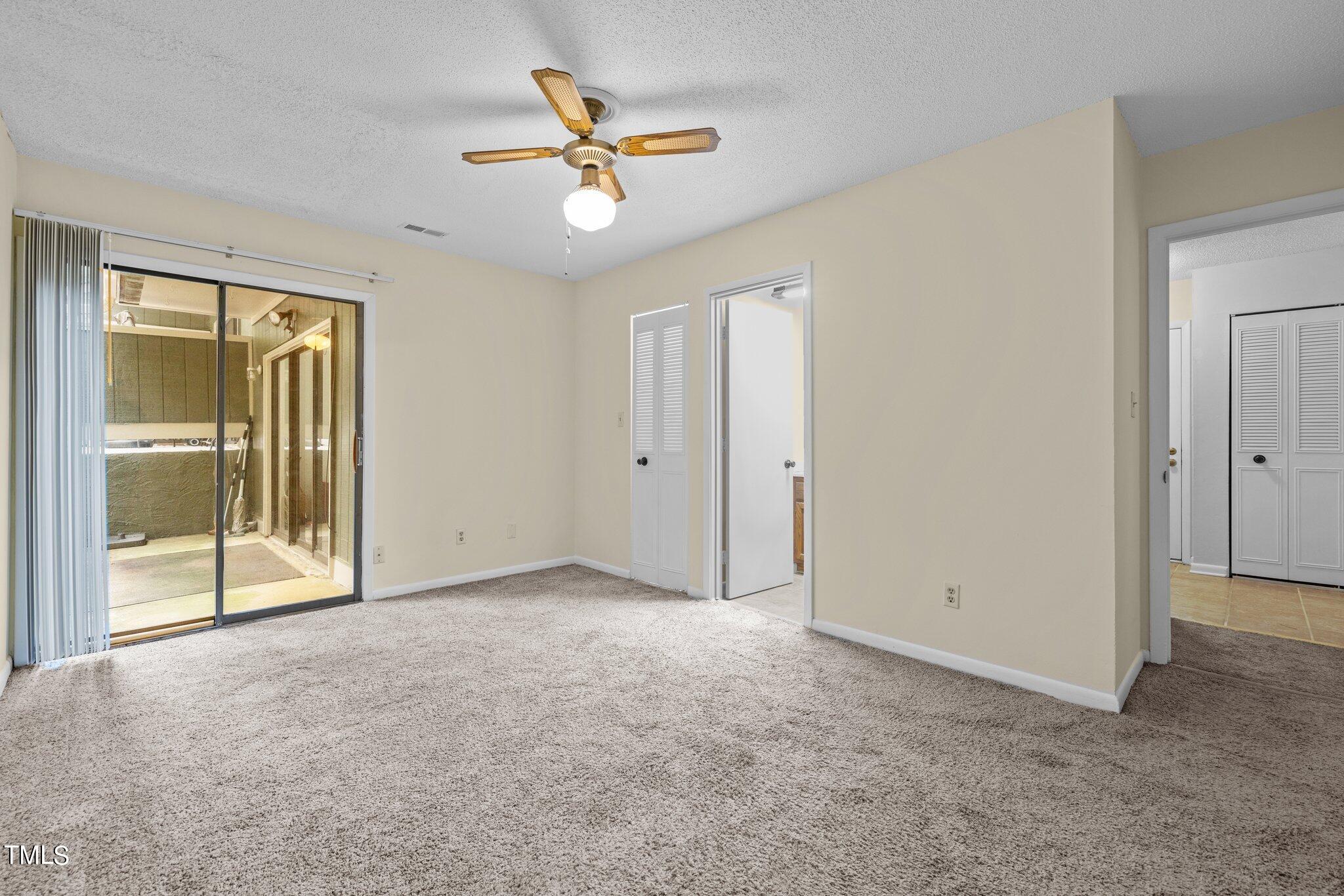 708 Godwin Court Raleigh, NC 27606 - Photo 35 of 48 a view of an empty room with a window