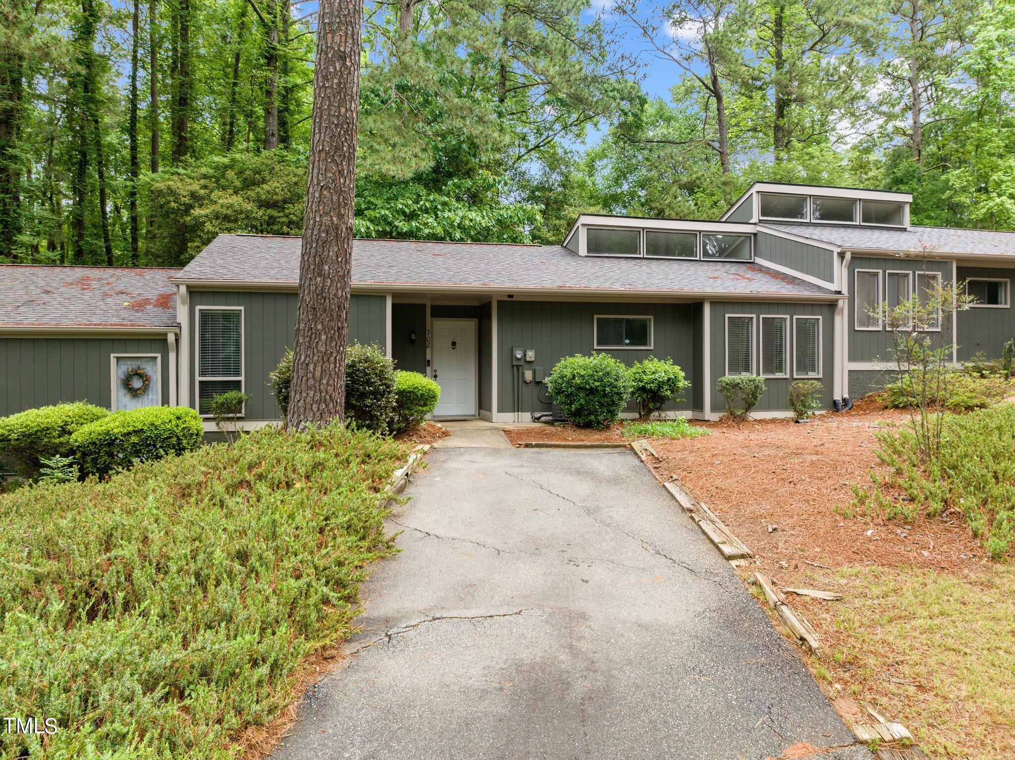 708 Godwin Court Raleigh, NC 27606 - Photo 5 of 48 front view of a house with a yard
