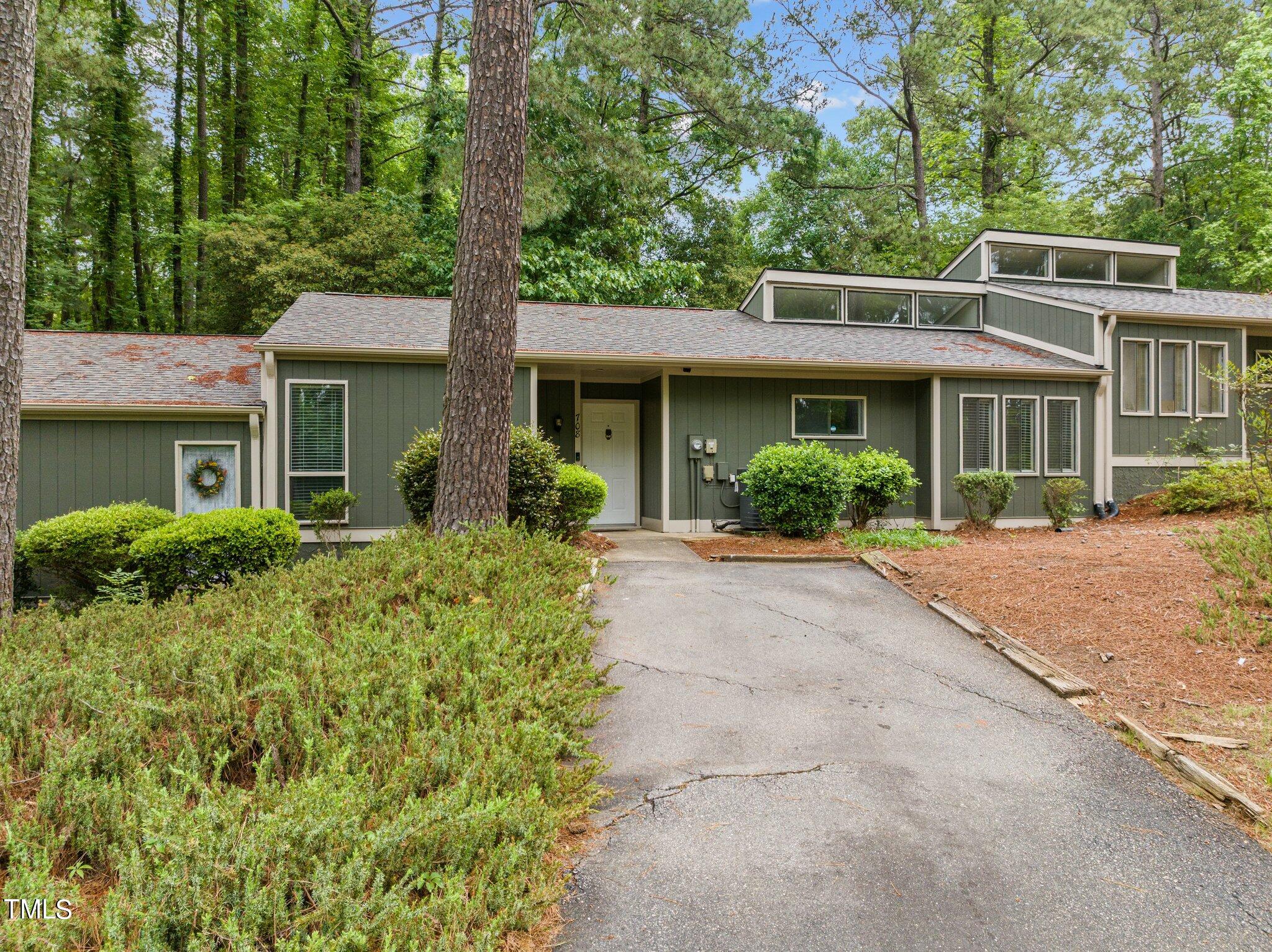 708 Godwin Court Raleigh, NC 27606 - Photo 7 of 48 front view of a house with a yard
