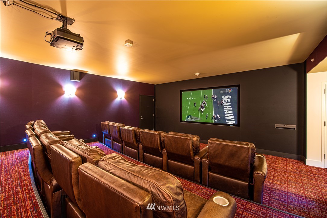910 Lenora Street, Unit S1203 Seattle, WA 98121 - Photo 26 of 39 a projector room with furniture