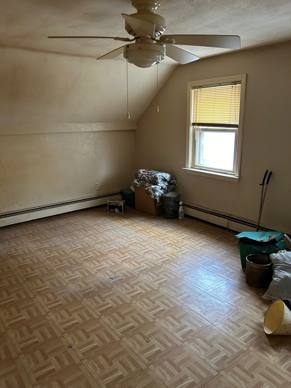 56 Cherry Street Chelsea, MA 02150 - Photo 6 of 10 a view of an empty room with a window