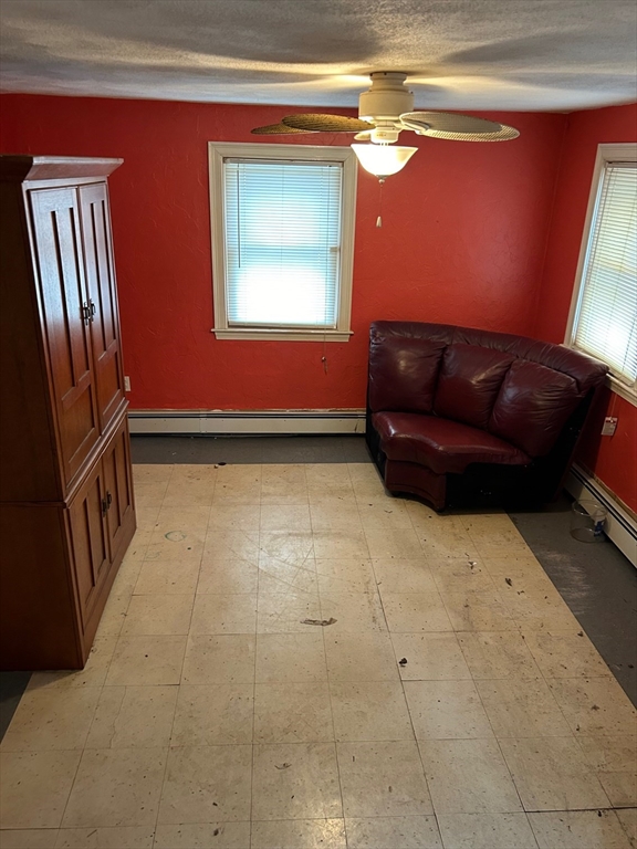 56 Cherry Street Chelsea, MA 02150 - Photo 7 of 10 a living room with furniture