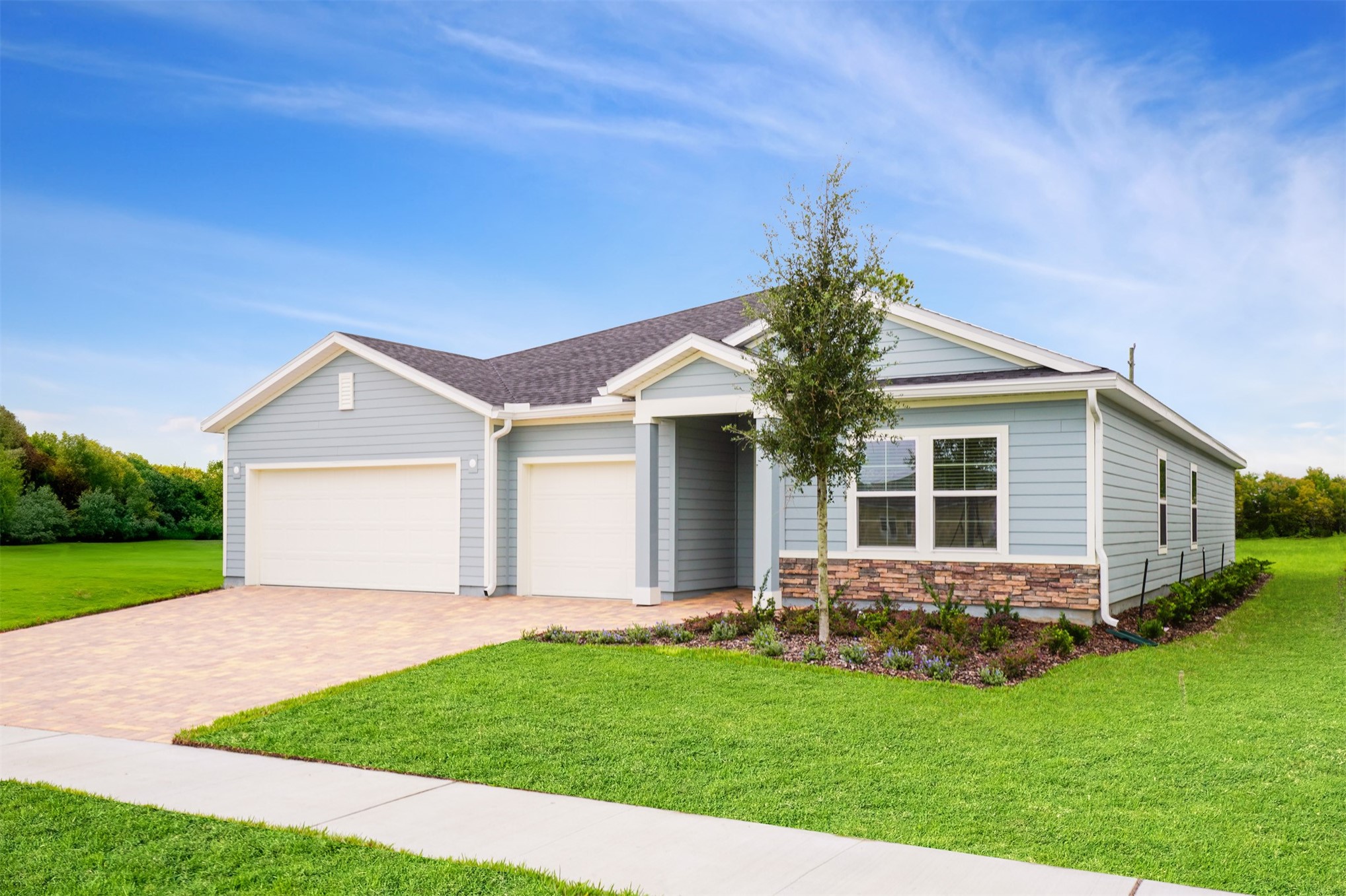 a view of a house with yard and front view of a house