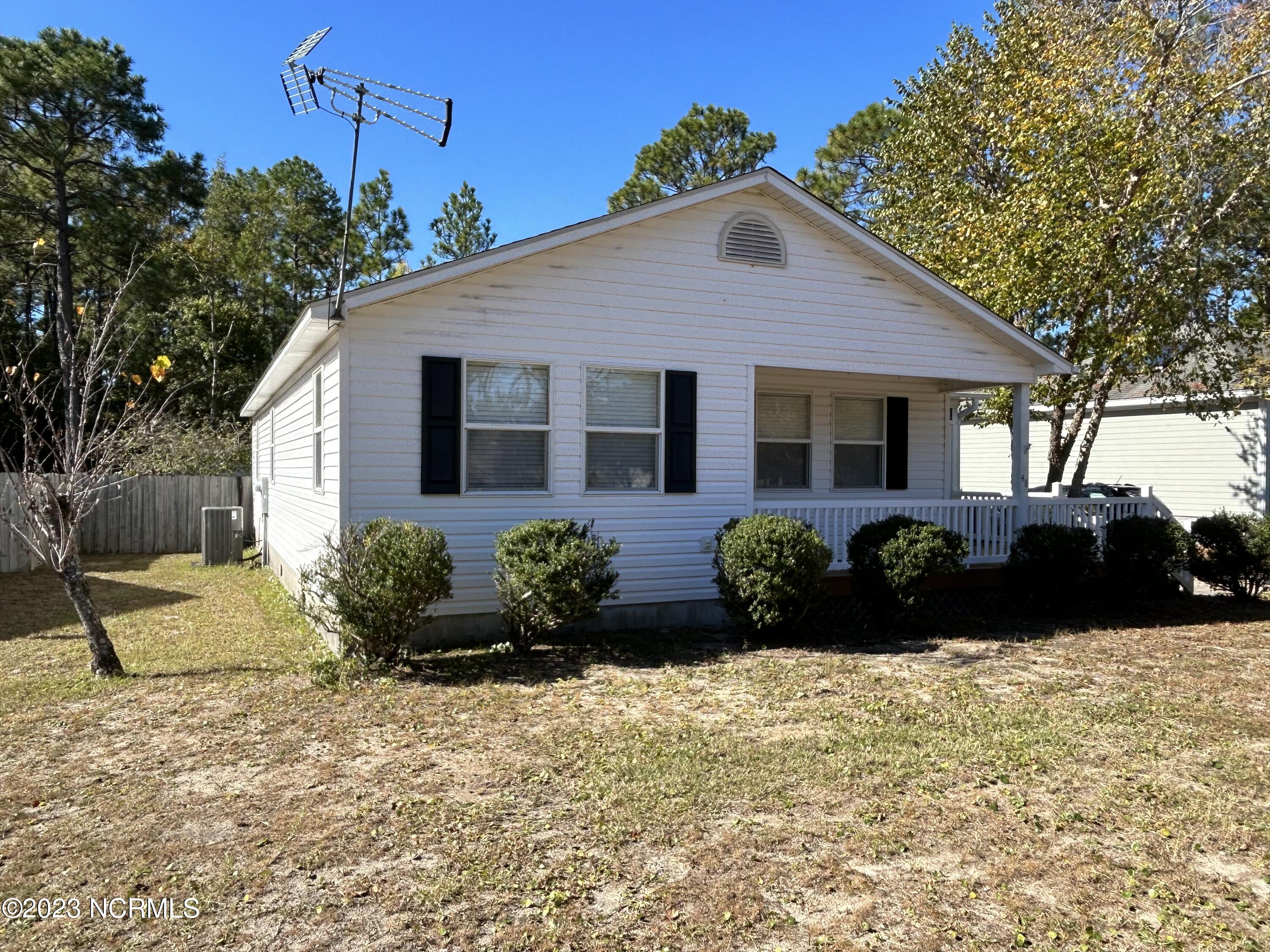 48 Burton Road Boiling Spring Lakes, NC 28461 - Photo 2 of 19 Front