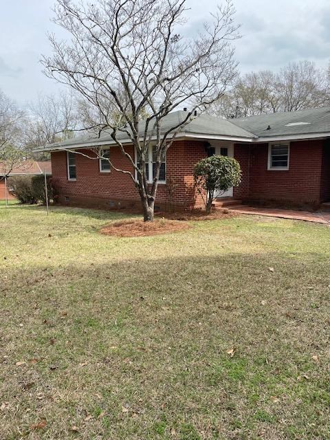 7215 Mobley Road Columbus, GA 31904 - Photo 2 of 16 a view of a house with a yard