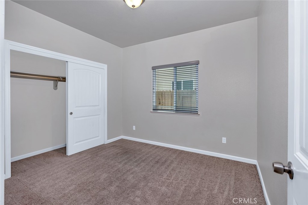 1476 Dynes Street Merced, CA 95348 - Photo 28 of 39 middle bedroom