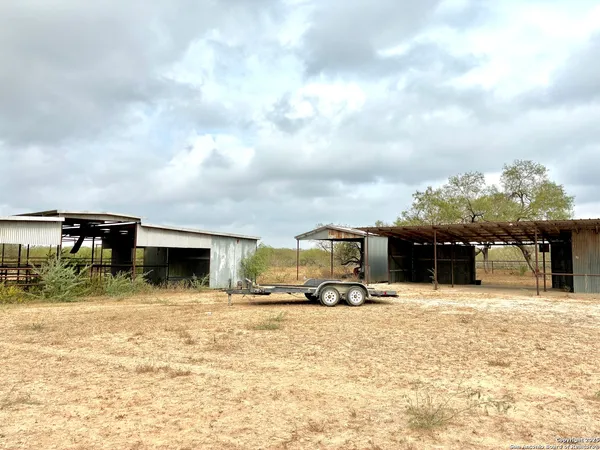 a view of car parked in front of house