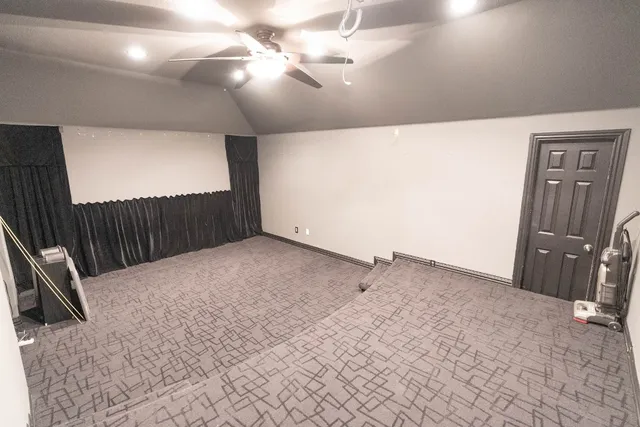 a view of a livingroom with a staircase