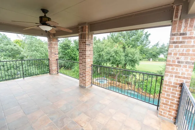 a view of a city from a porch
