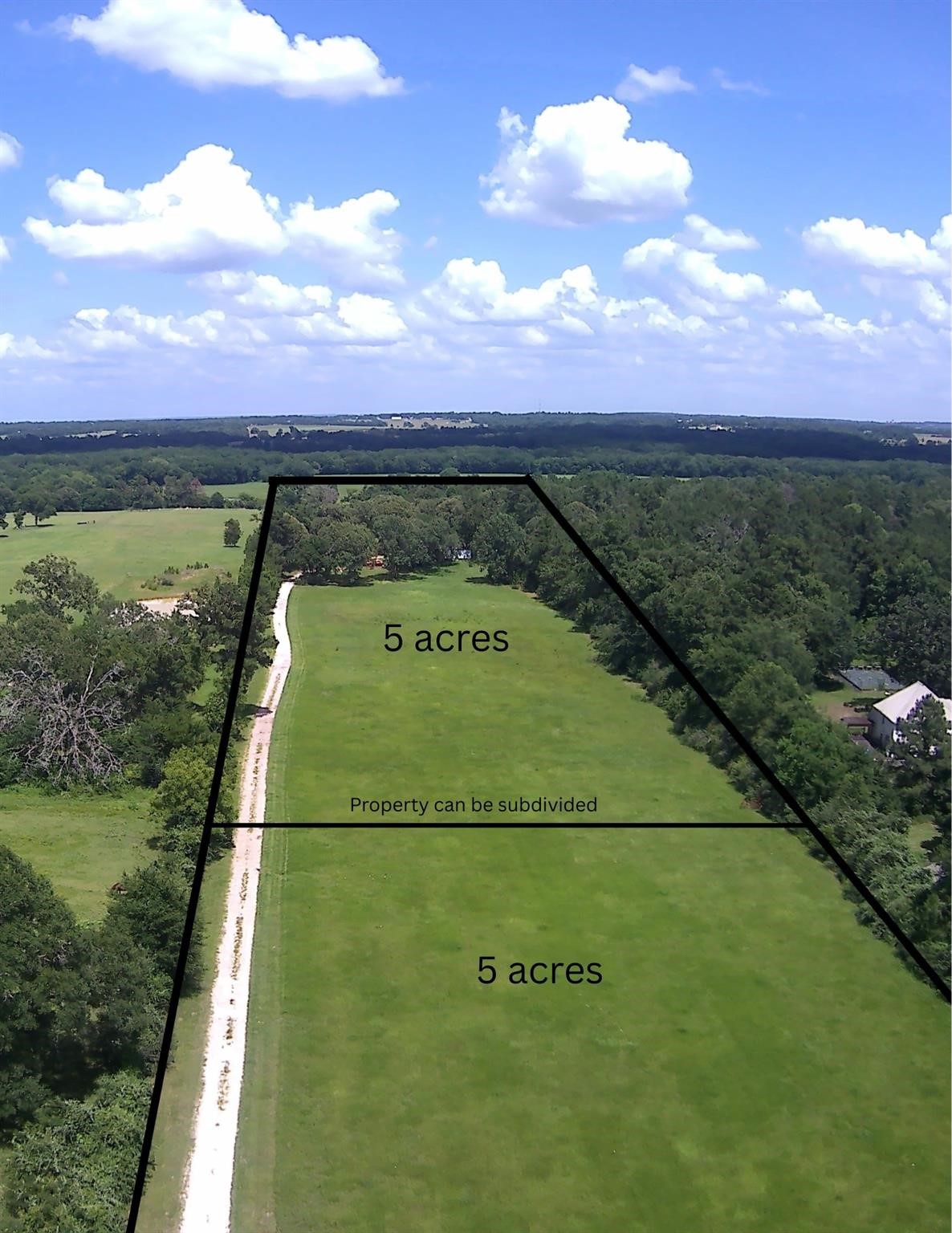 2264 North Fm 1486 Road Montgomery, TX 77356 - Photo 3 of 6 a view of a lake with a mountain in the background