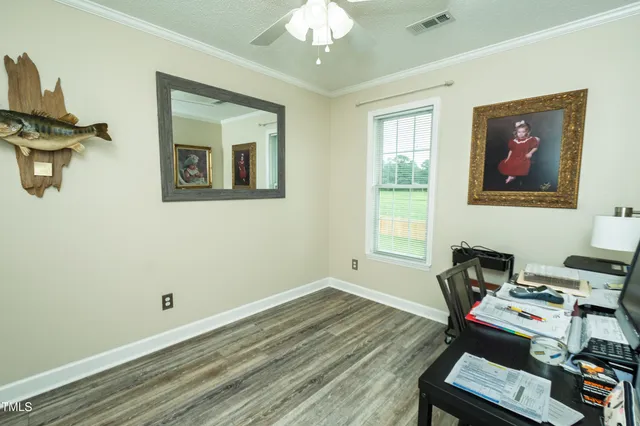 a workspace with furniture and a window